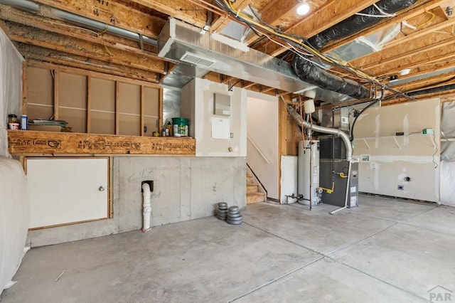 8718 Silver Glen Dr, Fountain, CO 80817 - unfinished basement with water heater and stairway