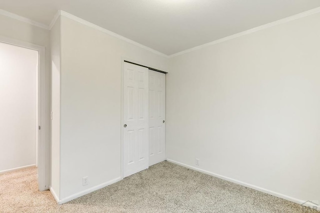 8718 Silver Glen Dr, Fountain, CO 80817 - unfurnished bedroom with light carpet, ornamental molding, and a closet