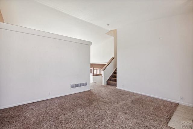 8718 Silver Glen Dr, Fountain, CO 80817 - spare room featuring carpet and stairs