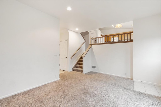 8718 Silver Glen Dr, Fountain, CO 80817 - unfurnished room with carpet floors, stairs, and recessed lighting