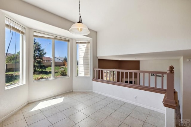 8718 Silver Glen Dr, Fountain, CO 80817 - spare room featuring plenty of natural light and light tile patterned flooring