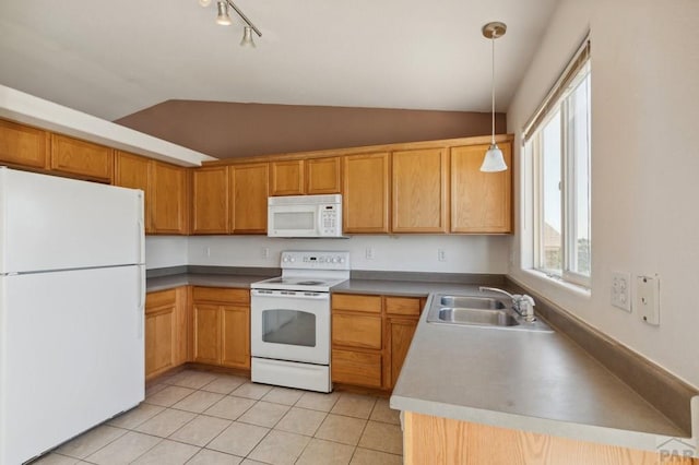 8718 Silver Glen Dr, Fountain, CO 80817 - kitchen with white appliances, vaulted ceiling, light tile patterned floors, decorative light fixtures, and rail lighting