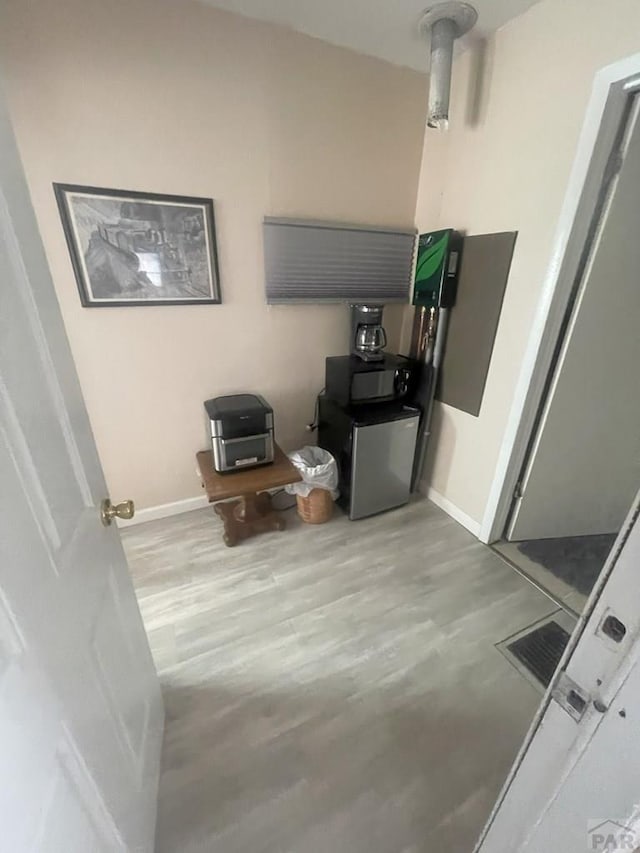 106 E 4th St, Antonito, CO 81120 - hall with wood finished floors and baseboards