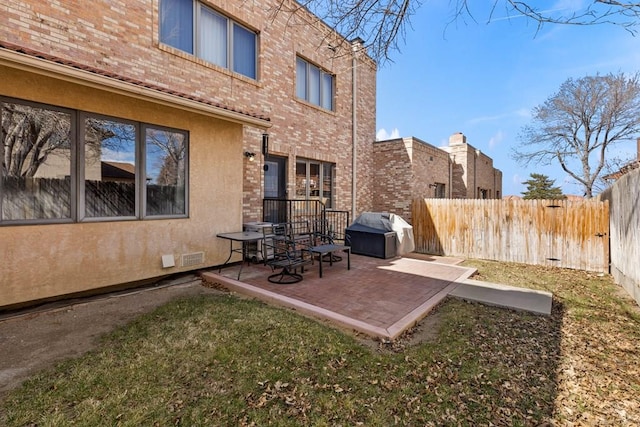 view of yard with a patio and fence