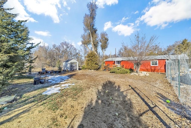 view of yard with a shed and an outdoor structure