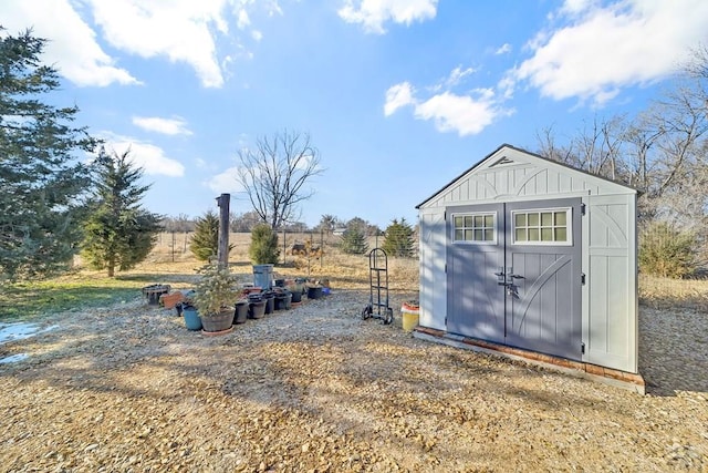 view of shed featuring a rural view