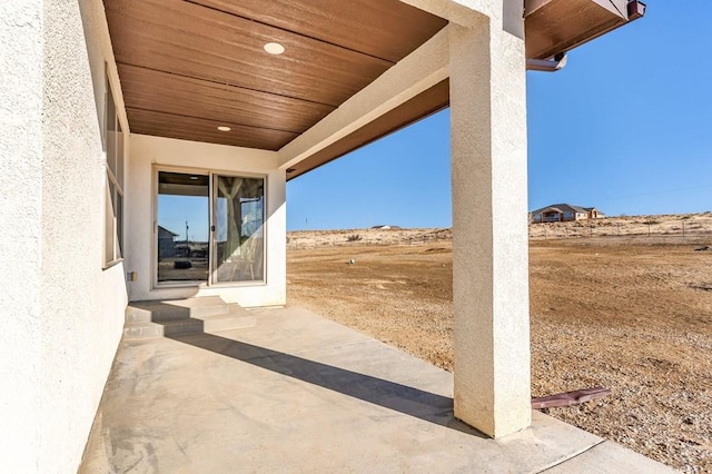 1216 N Whitetail Pl, Pueblo, CO 81007 - view of patio / terrace with entry steps