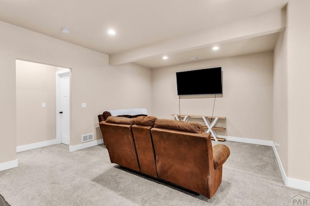 living area with baseboards, recessed lighting, visible vents, and light colored carpet