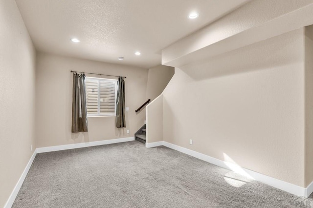 1216 N Whitetail Pl, Pueblo, CO 81007 - carpeted empty room with recessed lighting, baseboards, and stairway