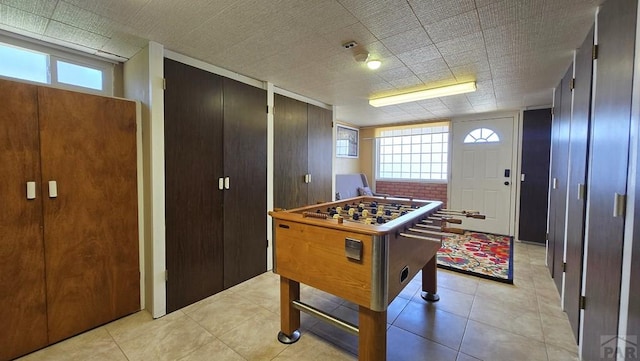 316 N Hooper Ave, Walsenburg, CO 81089 - recreation room featuring healthy amount of natural light and light tile patterned floors