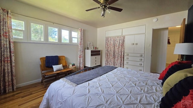 316 N Hooper Ave, Walsenburg, CO 81089 - bedroom with wood finished floors, a closet, and a ceiling fan