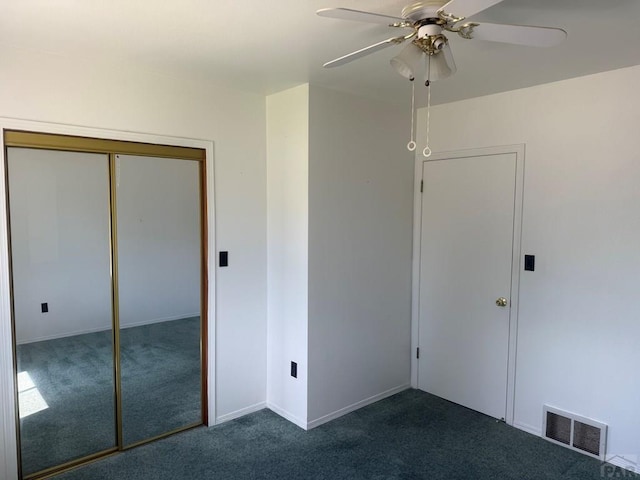 304 S Mullen, Lamar, CO 81052 - unfurnished bedroom featuring carpet floors, a closet, and ceiling fan