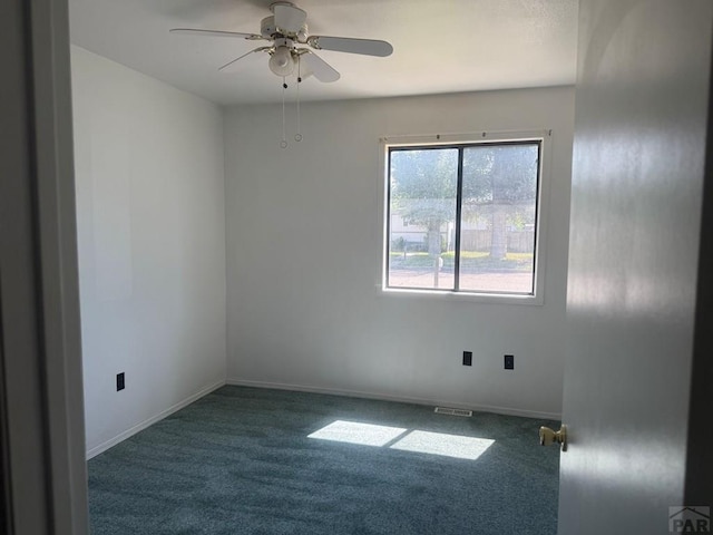 304 S Mullen, Lamar, CO 81052 - unfurnished room featuring carpet and a ceiling fan