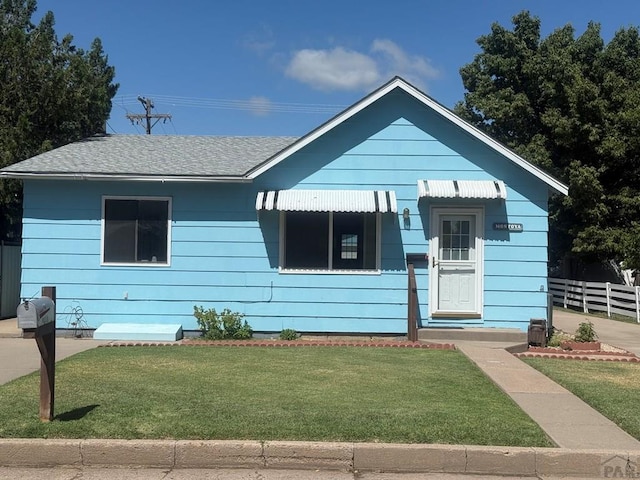 304 S Mullen, Lamar, CO 81052 - view of front of home with roof with shingles