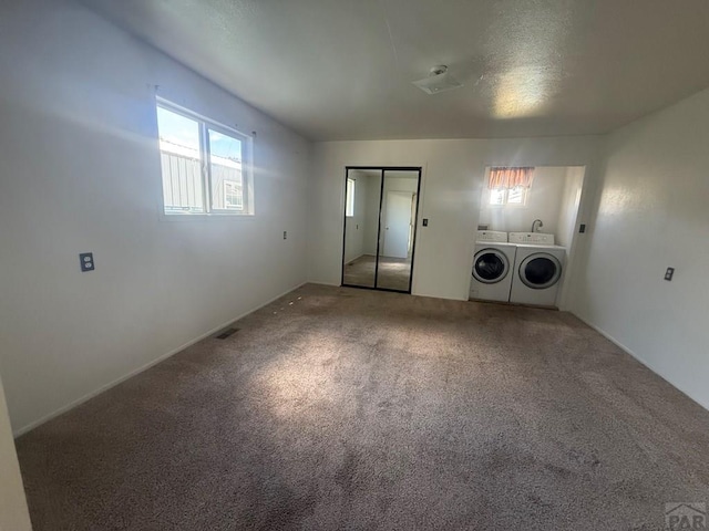 304 S Mullen, Lamar, CO 81052 - carpeted empty room with washer and dryer