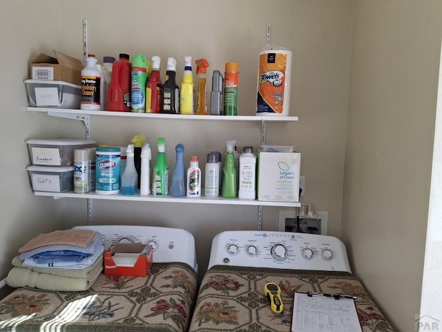 laundry room with separate washer and dryer