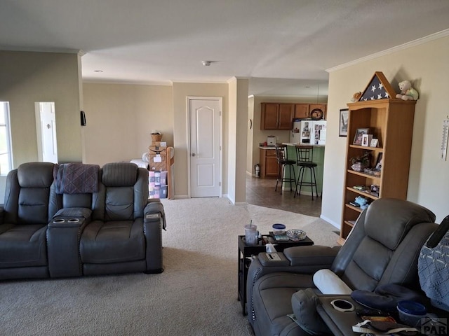 living room with carpet, ornamental molding, and baseboards