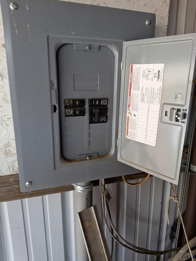 utility room featuring electric panel