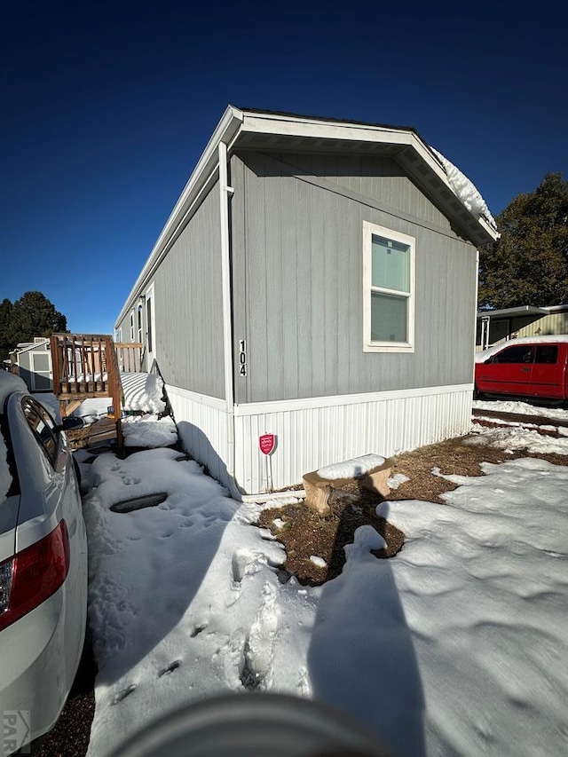 view of snow covered property