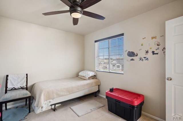 5073 Buchanan Dr, Pueblo, CO 81008 - bedroom with light colored carpet and ceiling fan