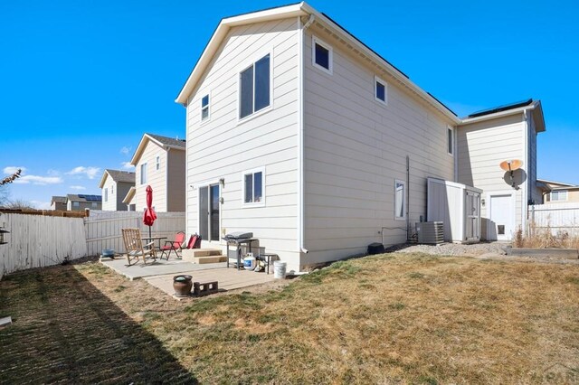 5073 Buchanan Dr, Pueblo, CO 81008 - rear view of property featuring a patio and a fenced backyard