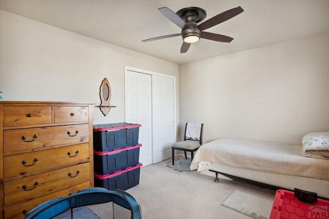 5073 Buchanan Dr, Pueblo, CO 81008 - bedroom featuring light carpet, a closet, and ceiling fan