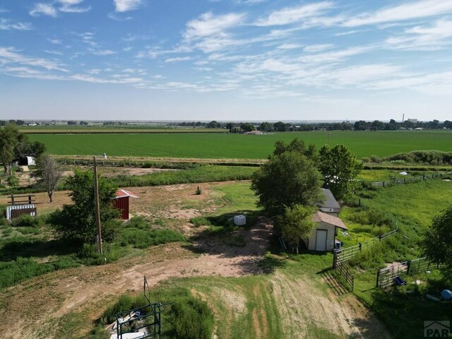 birds eye view of property with a rural view