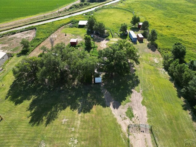 birds eye view of property featuring a rural view