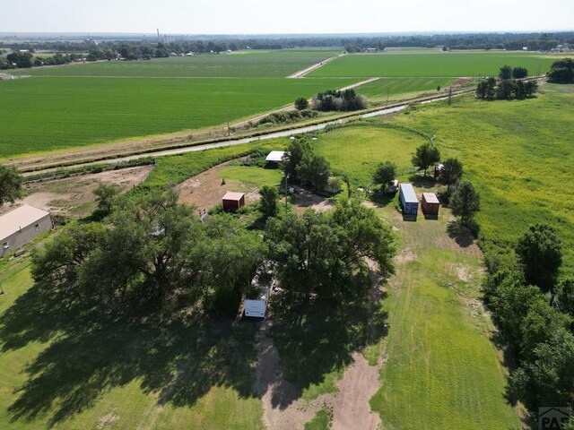 birds eye view of property featuring a rural view