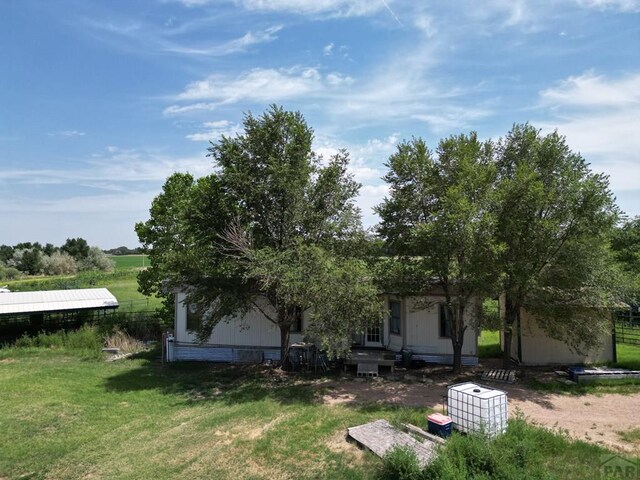 exterior space featuring a yard