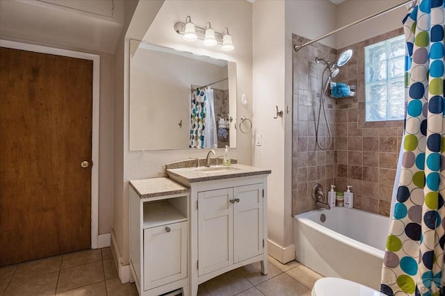 full bathroom featuring vanity, tile patterned flooring, and shower / tub combo with curtain