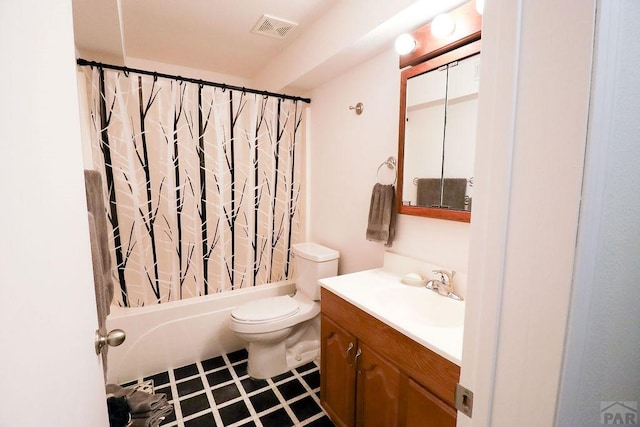 bathroom featuring toilet, shower / bath combo with shower curtain, vanity, and visible vents