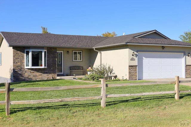 ranch-style home with a front yard, stone siding, an attached garage, and stucco siding