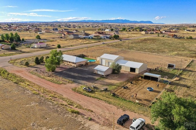 bird's eye view with a mountain view and a rural view