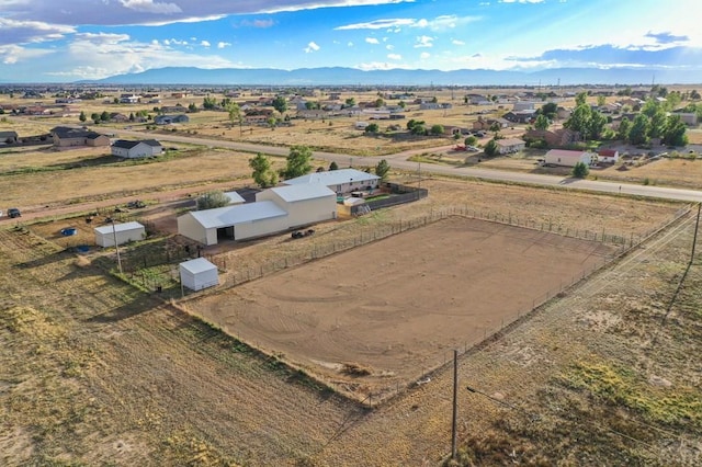 aerial view featuring a mountain view and a rural view