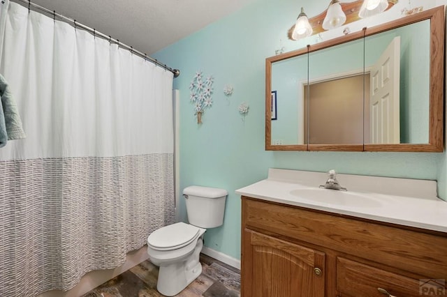 full bath with toilet, wood finished floors, vanity, baseboards, and a shower with curtain