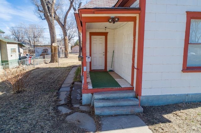 property entrance featuring fence