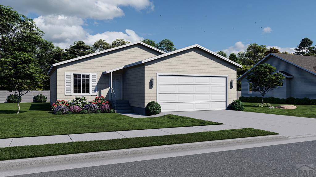 ranch-style house with a garage, driveway, and a front lawn