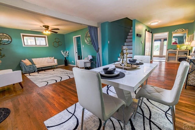 1232 Spruce St, Pueblo, CO 81004 - dining area featuring wood finished floors, a ceiling fan, and baseboards