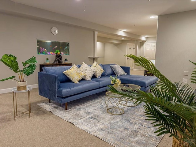 carpeted living room featuring recessed lighting and baseboards