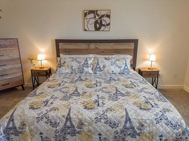 bedroom with baseboards and carpet flooring