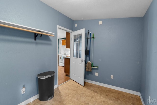 bedroom featuring baseboards