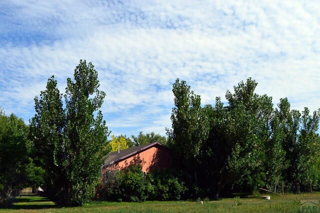 exterior space with a yard