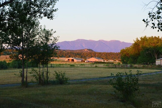 view of mountain feature with a rural view