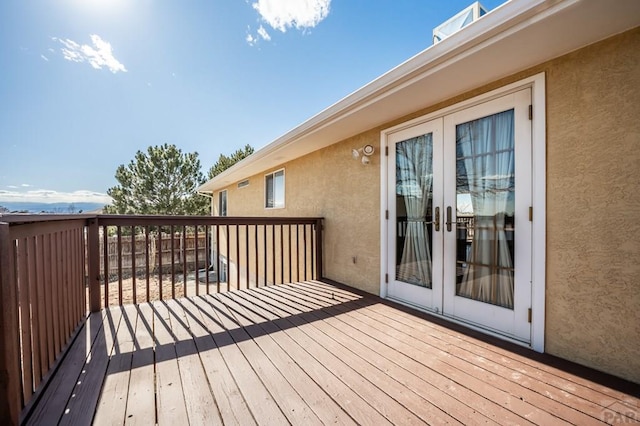 wooden terrace featuring french doors