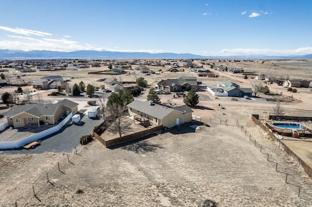 bird's eye view with a residential view and a mountain view