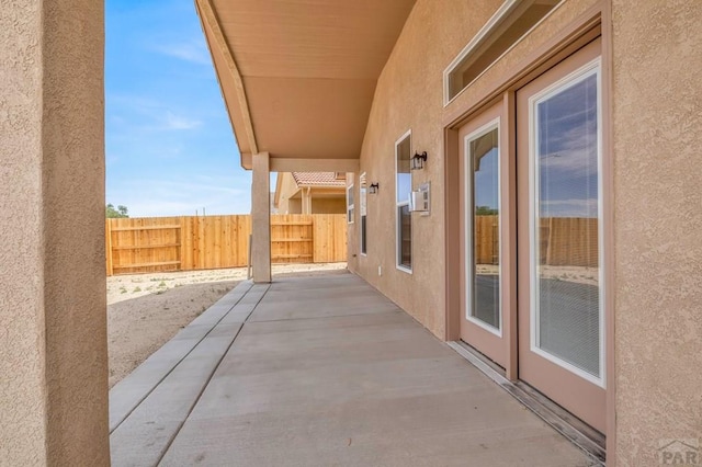 view of patio / terrace featuring fence