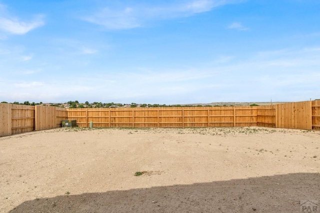 view of yard featuring a fenced backyard