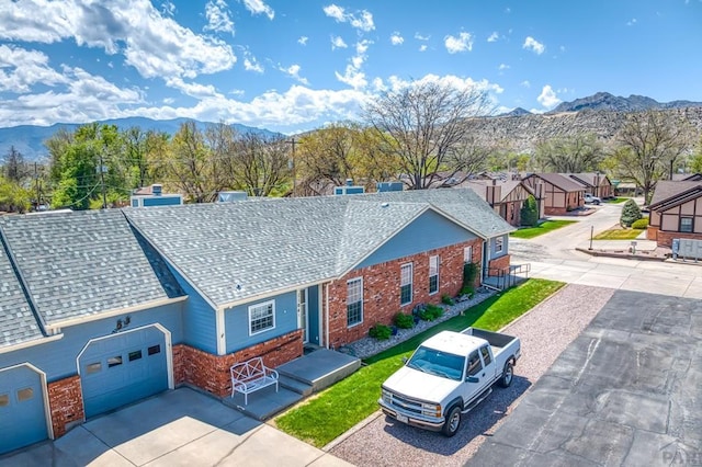 1104 Fairview Ave Unit A, Canon City, CO 81212 - aerial perspective of suburban area with a mountain backdrop