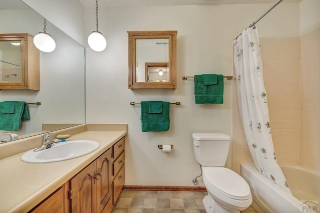 1104 Fairview Ave Unit A, Canon City, CO 81212 - bathroom featuring baseboards, toilet, shower / bath combo with shower curtain, and vanity